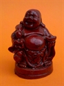 Bild von Buddha Rot [Auf einem Sockel sitzend]